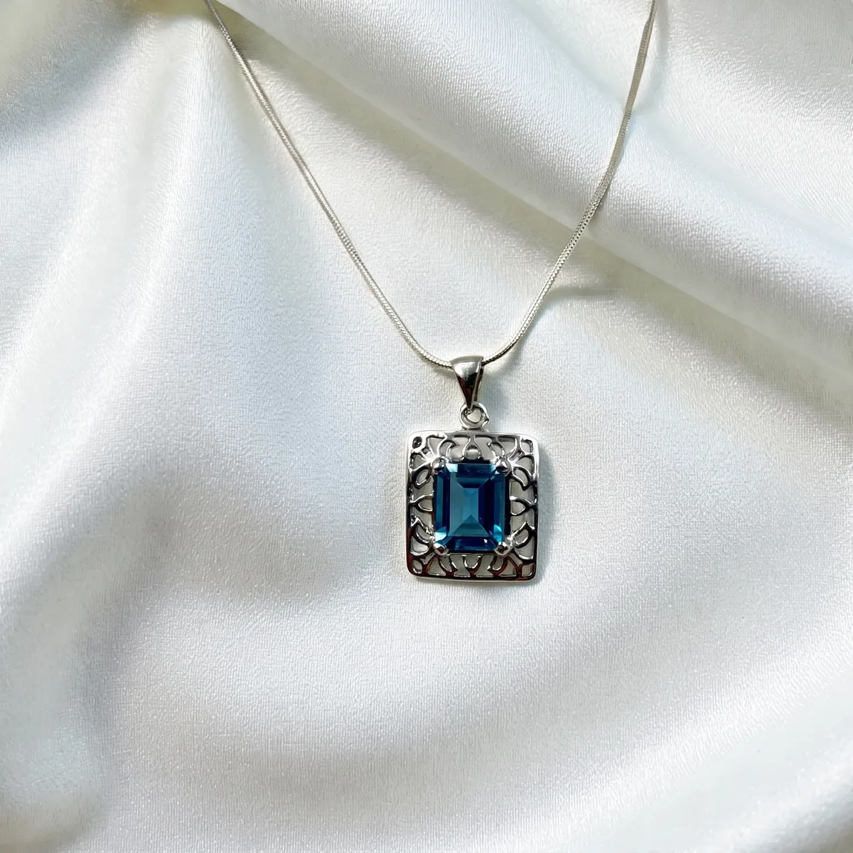 Azure Blue Topaz Crest Pendant - view 1